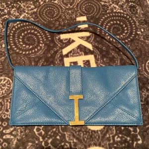 Barely used designer clutch bag